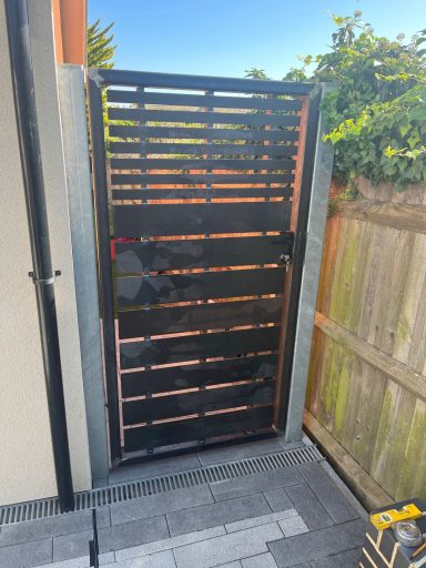 Small custom-made steel pedestrian gate with composite inserts installed by IGS Systems in Kent